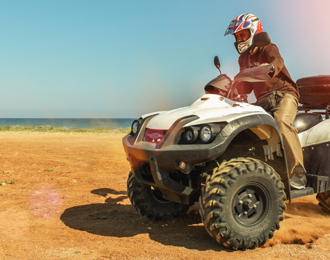 Half an hour riding a quad bikes on the beach