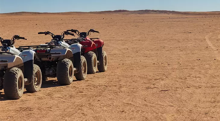 Half an hour riding a quad bikes on the beach