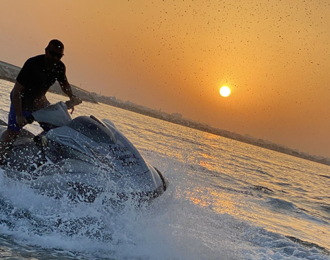 Jet ski at sunset