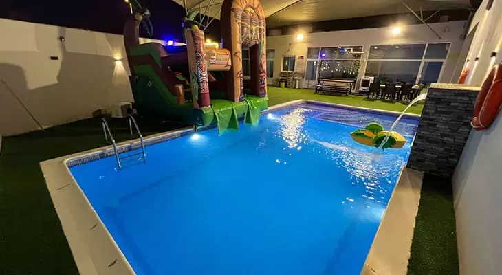 Chilling By The Pool in a Smart Pool Chalet in Bahrain.